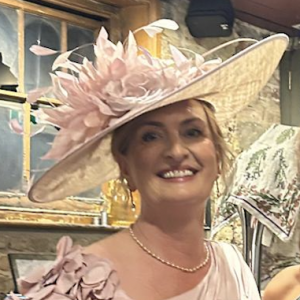 Large Oval Champagne/Oyster hat with Shimmer and Pale Pink Silk Rose and Feathers